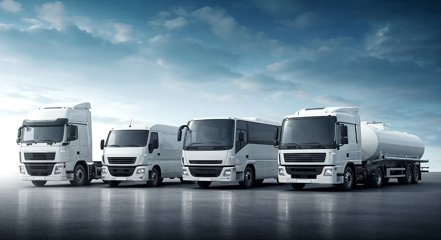 Fleet of modern industrial trucks and commercial vehicles showcasing FPT Industrial powered transportation solutions